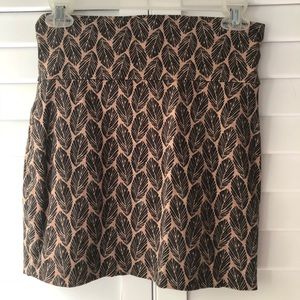 Tan and black leaf print bodycon mini skirt